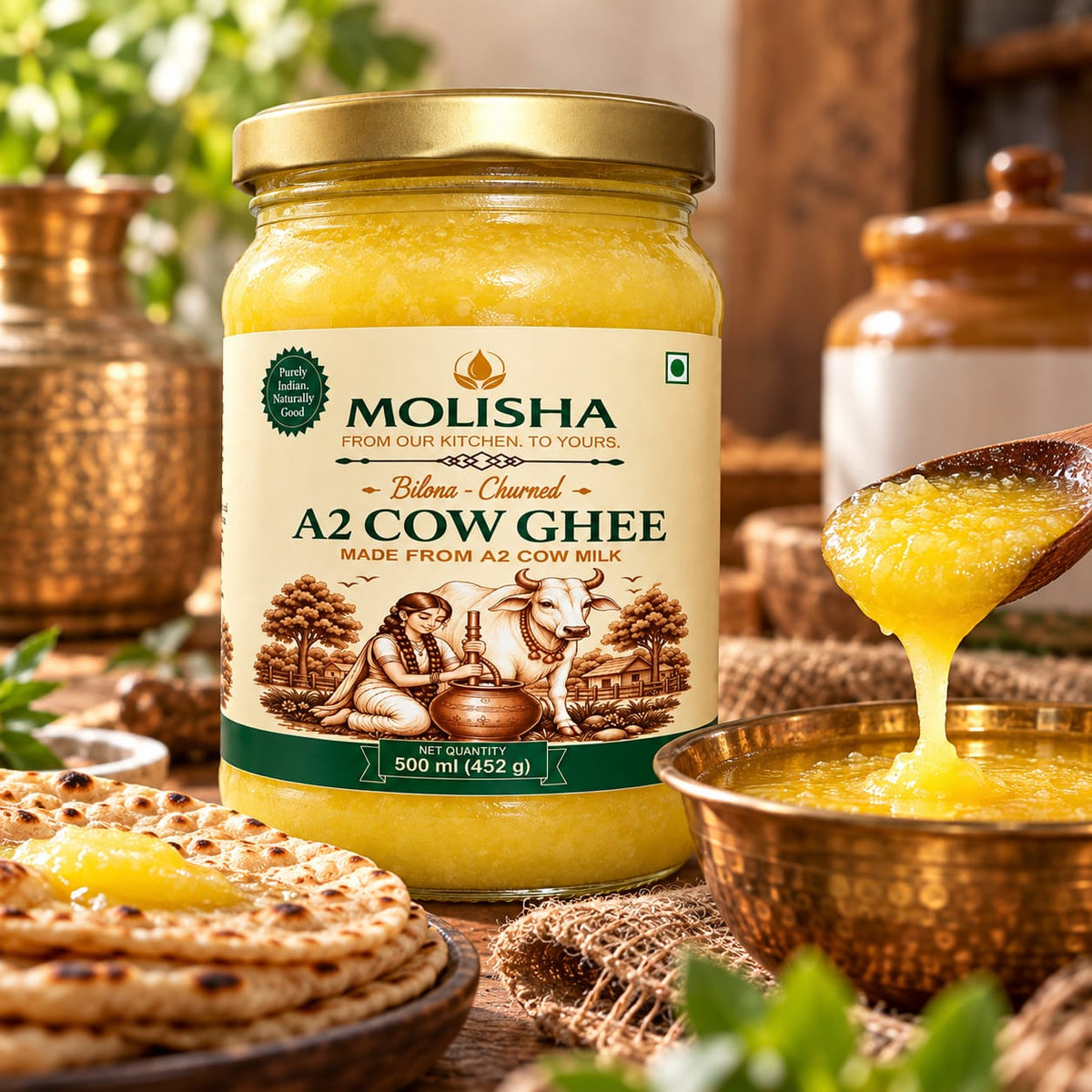 A jar of Molisha A2 Cow Ghee is shown in a rustic kitchen setting with a spoon of thick yellow ghee dripping into a copper bowl, flatbread with ghee, and decorative jars in the background.